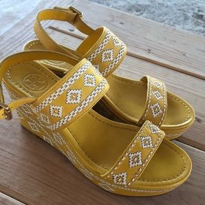 Yellow and white leather Tory Burch wedges.